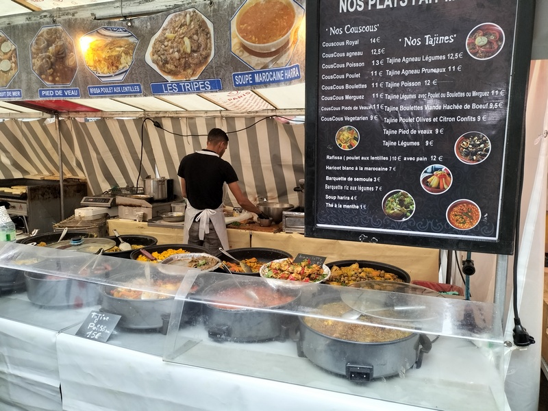 A stand selling couscous at Saint-Eustache-Les Halles outdoor market in Paris